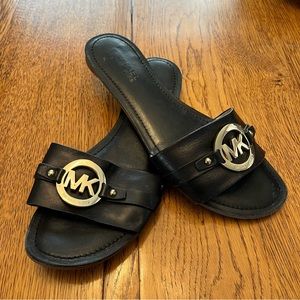Michael Kors, sandals, size 7 color black in good condition.